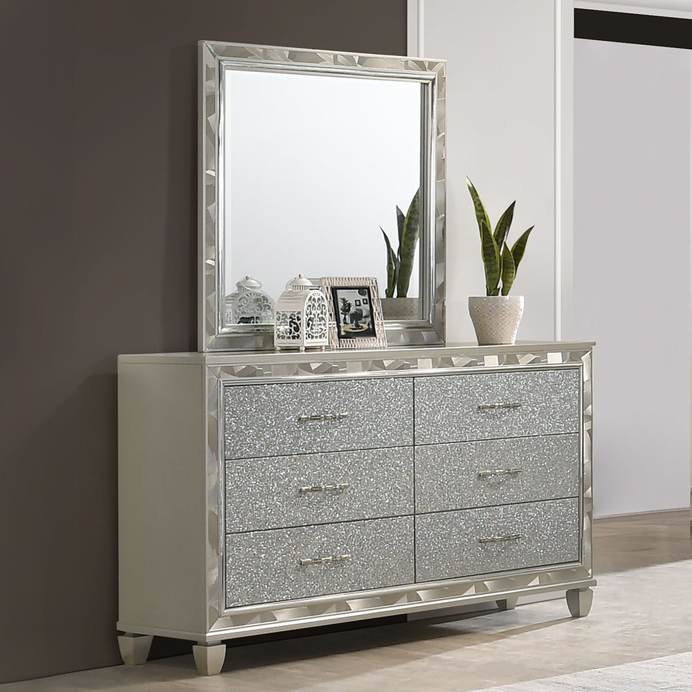 Experience sophistication and functionality with the Radiance Dresser & Mirror in Silver. Crafted with a blend of Solid Rubberwood and manufactured woods, this set ensures unmatched stability and durability. The semi-gloss lacquer Platinum Silver finish a
