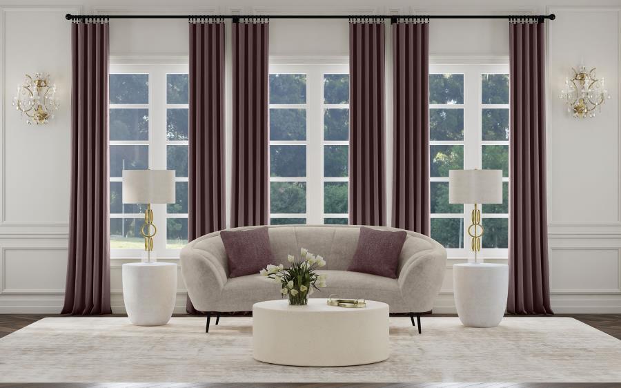 Show off your curve appeal with this updated kidney silhouette that blends fresh appeal and timeless elegance in a modern loveseat. This great piece, featuring soft, neutral beige upholstery, is perfect to float in the center of a room as an attractive fo