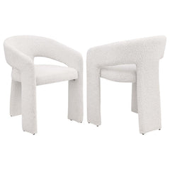 Refresh the look and feel of a modern dining room with a contemporary armchair. Stylish presence is created with its rounded silhouette, pairing a keyhole design with sloping arms for airy ambiance. Three wide legs provide excellent support, while foam cu