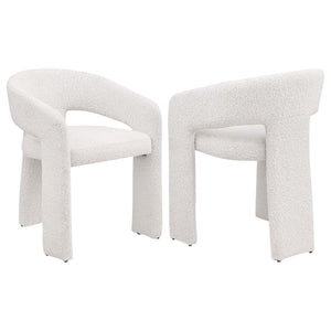 Refresh the look and feel of a modern dining room with a contemporary armchair. Stylish presence is created with its rounded silhouette, pairing a keyhole design with sloping arms for airy ambiance. Three wide legs provide excellent support, while foam cu
