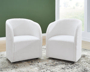  this fully upholstered dining chair makes a lasting impression in a simply stunning way. Its magnificent curved silhouette is enhanced with a neutral boucle upholstery thatâ€™s so pleasing to the palate. This is the piece youâ