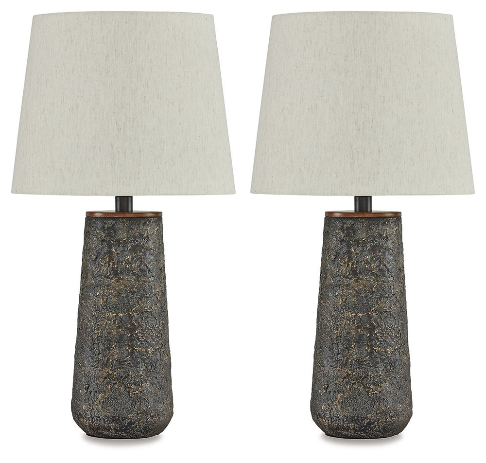Modern industrial design in a new light. A mixed-media masterpiece, this table lamp provides maximum interest and exceptional versatility with its heavily textured surface. Whether resting on your nightstand or set on a side table, it delivers a unique ae