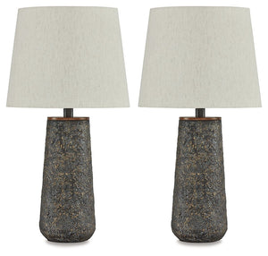 Modern industrial design in a new light. A mixed-media masterpiece, this table lamp provides maximum interest and exceptional versatility with its heavily textured surface. Whether resting on your nightstand or set on a side table, it delivers a unique ae