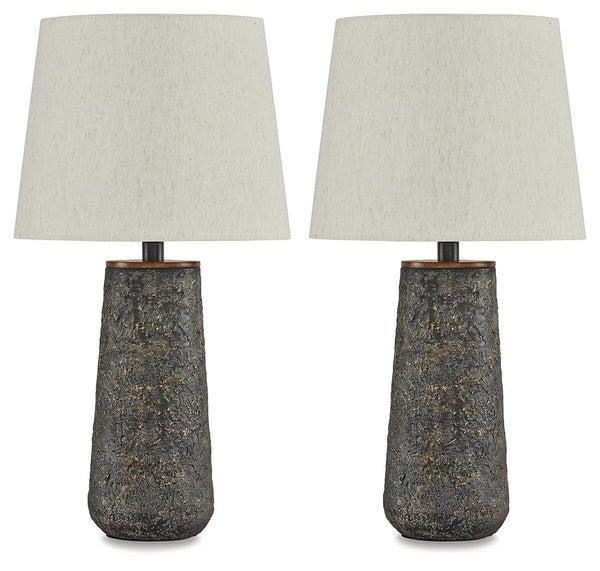 Modern industrial design in a new light. A mixed-media masterpiece, this table lamp provides maximum interest and exceptional versatility with its heavily textured surface. Whether resting on your nightstand or set on a side table, it delivers a unique ae