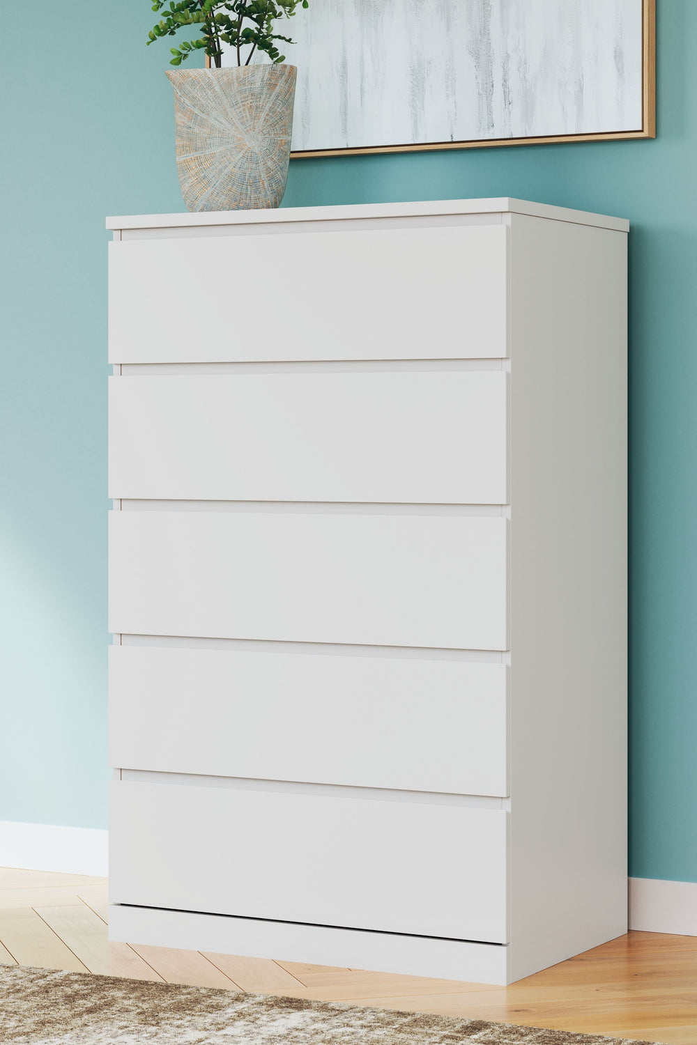 Create the modern bedroom of your dreams. This chest of drawers offers a minimal design with maximum style, combining ultra-clean lines and an easy-elegant solid white finish with a hardware-less aesthetic. Spacious drawers with ball-bearing glides make p