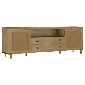 This refined entertainment unit transforms your living room with artisanal detail. Accommodating up to 85-inch displays, this TV stand integrates Asian hardwood, engineered wood, ash veneer, and rattan. A modern neutral finish and aged brass legs exude ti
