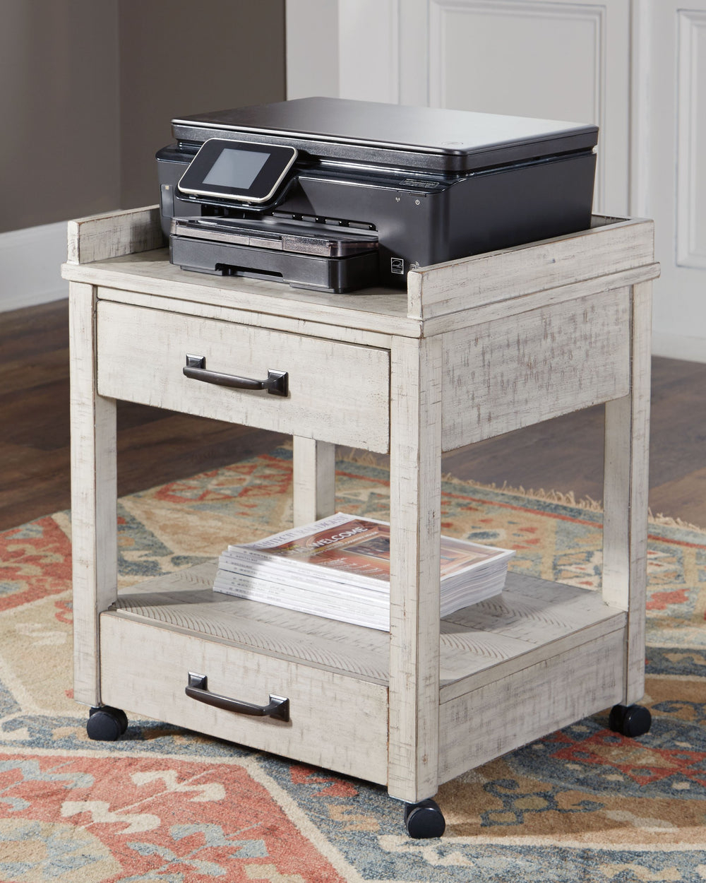 Set on casters for easy mobility, this printer stand rolls out a fresh look in modern farmhouse living. Two smooth-gliding drawers with dovetail construction reflect high quality that never goes out of fashion. Pair of electrical outlets and USB charging 