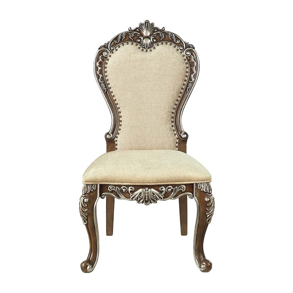The Latisha side chairs bring comfort and elegant traditional style into your dining room. With plush seat cushions and padded backrests, dinner parties will surely last for hours. Against the antique oak, the floral moldings are highlighted with silver h