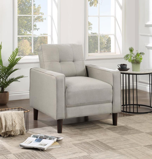 this chair boasts a perfect small-scale design. Its classic track arm and self-welt detailing highlight the superior tailoring. The grid-tufted boxed back cushions and pocket coil spring cushion construction ens