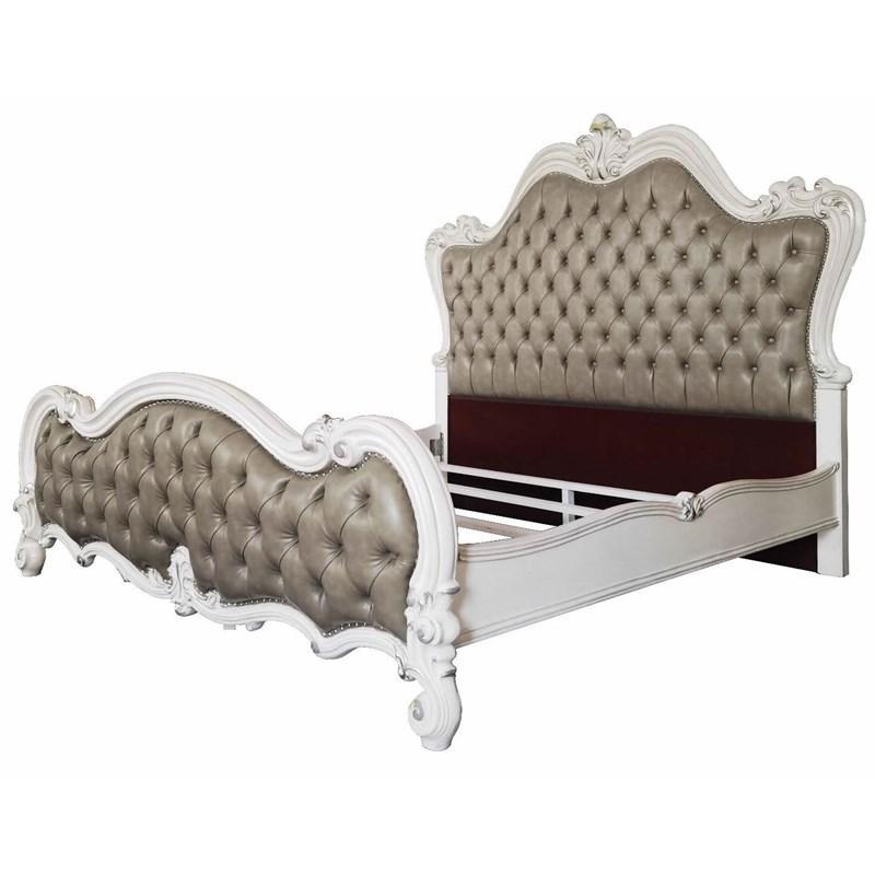 Turn your bedroom into a classy abode with this sophisticated Versailles II bed in a vintage gray PU and bone white finish. The curved wood trim on the headboard and footboard is accentuated with a fluted seashell motif crown. The deep button tufting adds