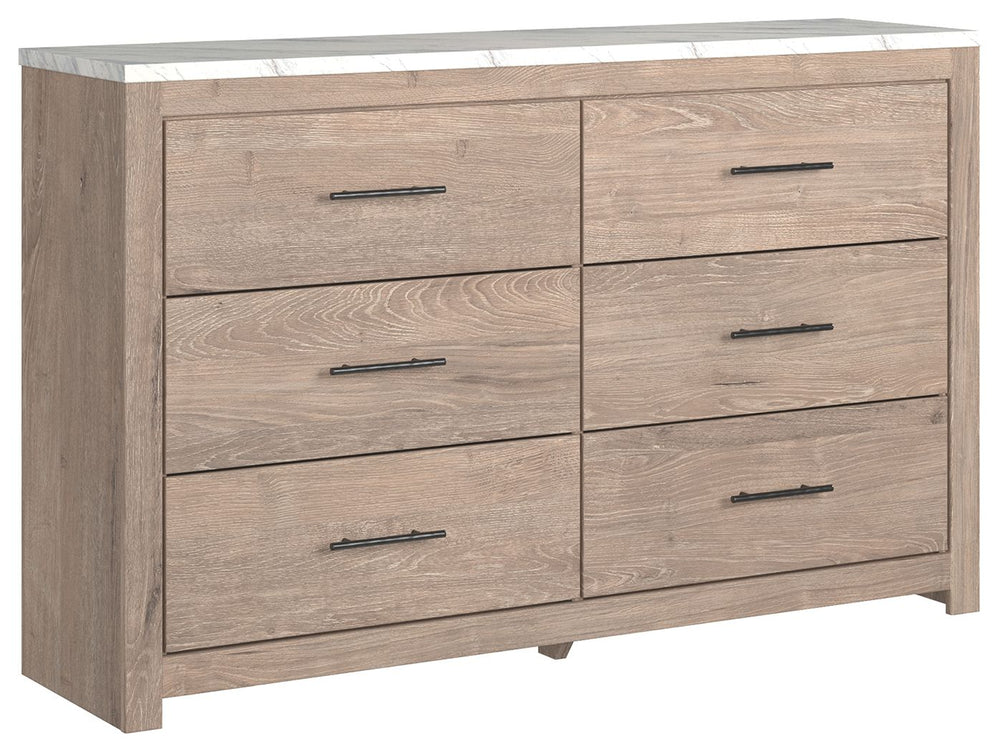 Cool, clean and casually modern. This dresserâ€™s light natural finish and faux Calcutta marble top set the tone for your calming sanctuary. Large linear pulls add dimension and authenticity. Six smooth-gliding drawers neatly accommodate your wardrobe nee