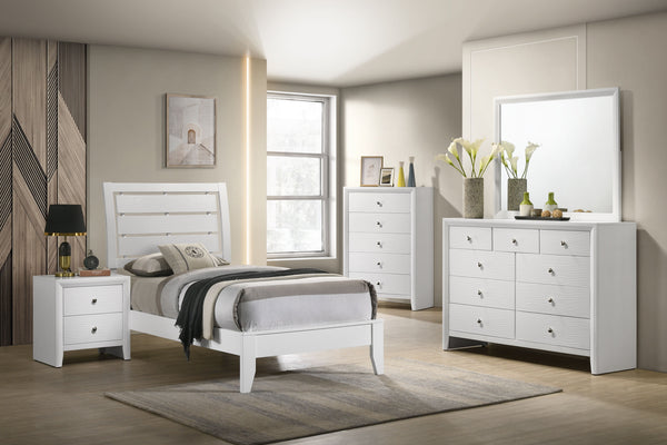 This inviting bedroom set features a refreshing white finish with subtle textural details that add a touch of modernity. The clean-lined bed boasts a distinctive headboard with horizontal slats that create an airy, open feel, promoting relaxation. Complem