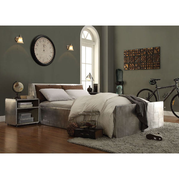 The Brancaster nightstand combines a vintage look with a classical design, perfect for any formal or casual bedroom. This rectangular nightstand features a USB/Power dock, Nailhead trim, casters and two open storage compartments. The vintage look and clas