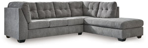 This sectional with chaise takes a homey approach to high style. Its gray coloration has classic versatility, while a contemporary silhouette and stitched details keep the look totally on trend. And you can count on comfortâ€”the chaise invites you to kic