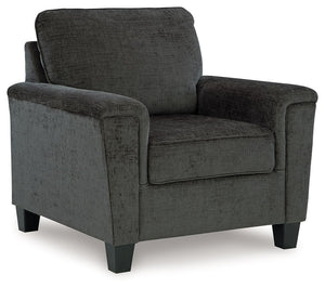 Thereâ€™s something about this chair thatâ€™s so easy to appreciate. Maybe itâ€™s the plush upholstery and soothing tone, eager to support your quest for total relaxation. Perhaps it-'s the modern flair of its simple lines, track arms and tapered accent l