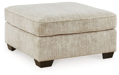 This oversized ottoman speaks to those drawn to fresh, contemporary style with richly neutral appeal. The footrest-'s generous size invites everyone to delight in its comfort. Subtle and sophisticated, the plush upholstery and dark tri-block legs are a na
