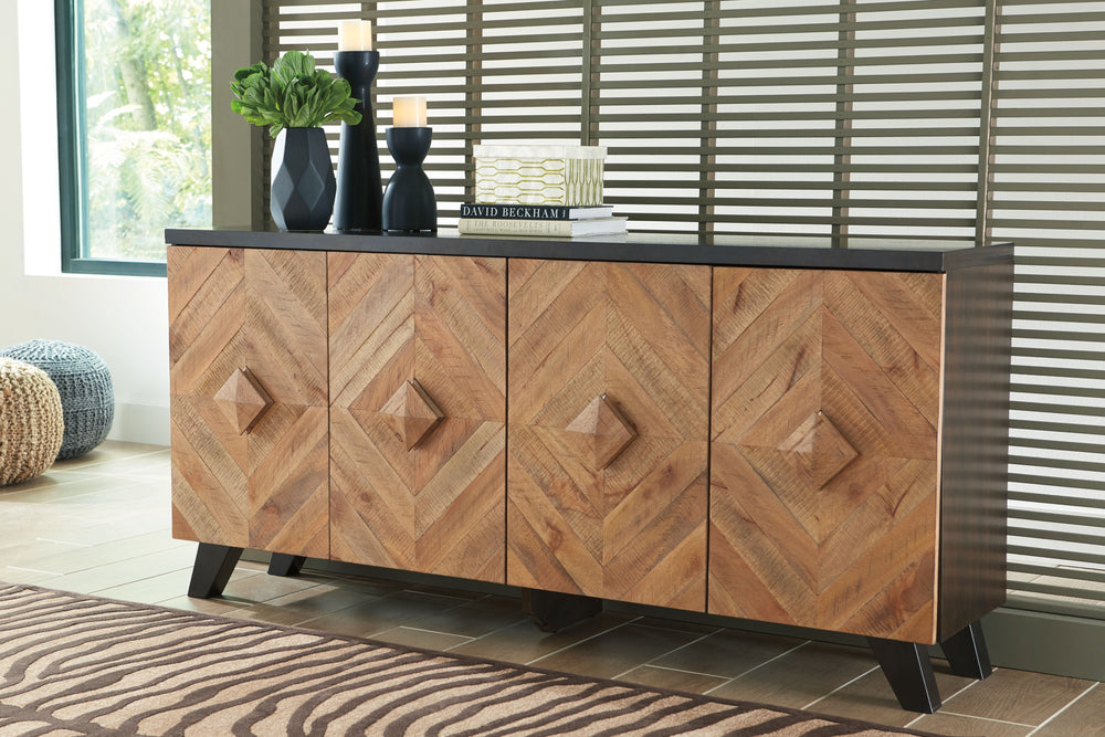 Diamond life. Make a bold, brilliant statement with this 4-door accent cabinet. Its two-tone styling merges a dark brown exterior with a multi-tonal distressed finish on the doors and handles. A diamond-shaped plank effect brings rich, dimensional flair t