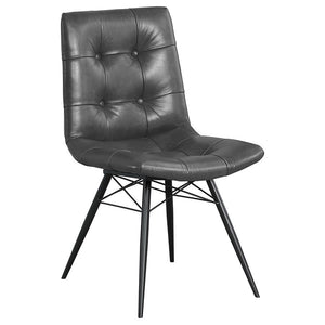  its gently curved tufted seat and backrest offer a supportive and inviting feel. Angled m
