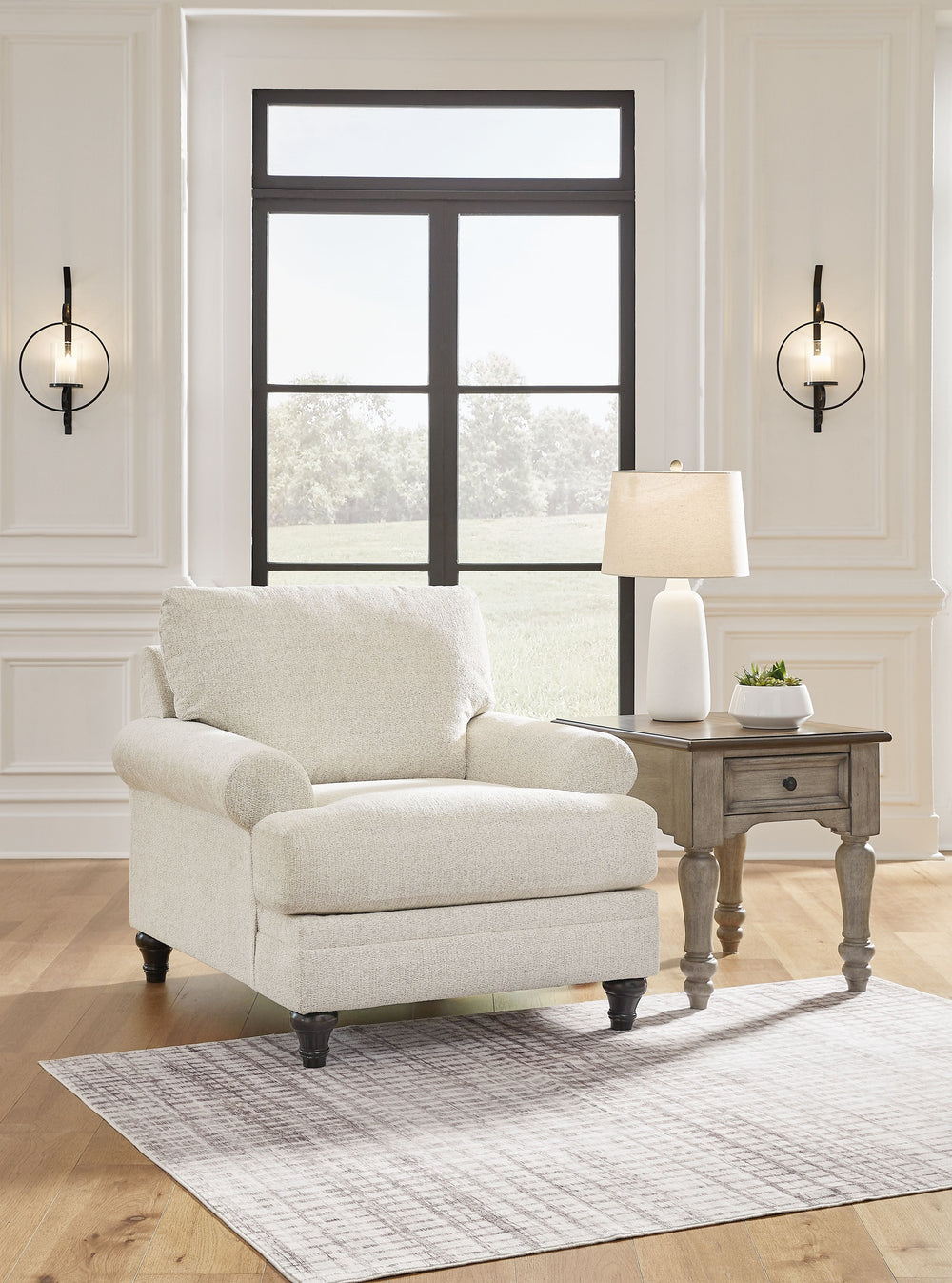 Seeking simple, transitional style? Enter this chair. Its commitment to carefree comfort is right at home with your relaxed living room aesthetic. A subtle chevron effect elevates the everyday charm of the neutral fabric, while the deep, plush seat brings