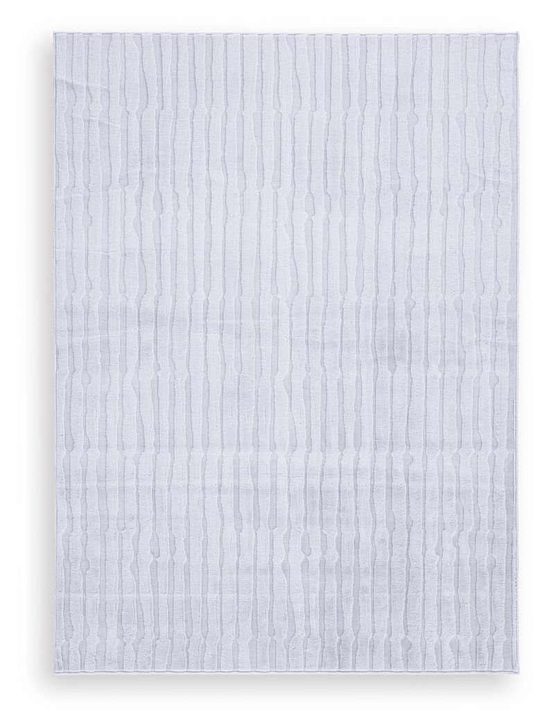 Impress with contemporary cool character. This rug welcomes visitors with subtle stripes and soft faux fur underfoot, while its neutral gray is an understated way to dress up your floor. Plus it-'s machine washable for fuss-free cleaning.<br/><br/><b>Prod