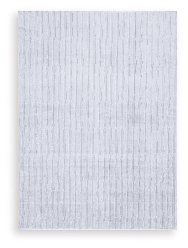 Impress with contemporary cool character. This rug welcomes visitors with subtle stripes and soft faux fur underfoot, while its neutral gray is an understated way to dress up your floor. Plus it-'s machine washable for fuss-free cleaning.<br/><br/><b>Prod