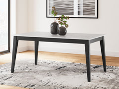 This dining table exudes modern sophistication. Finished in a sleek black wood tone, it-'s adorned with a stunning white faux marble tabletop. The piece serves a simply striking feast for the eyesâ€”now your only worry is what to serve for dinner.<br><br>