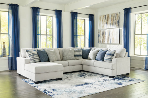 What a pleasant surprise: high-end luxury made comfortably affordable. Thatâ€™s what makes this sectional with chaise in stone gray so alluring. Made exclusively for those wanting to make a designer statement, this finely crafted sectional is dressed to i