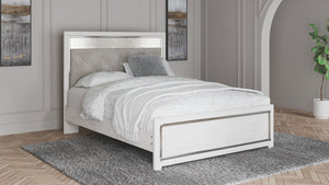  this queen panel platform bed is a beautiful blend of comfort and luxury. Shiny chrome-tone accents