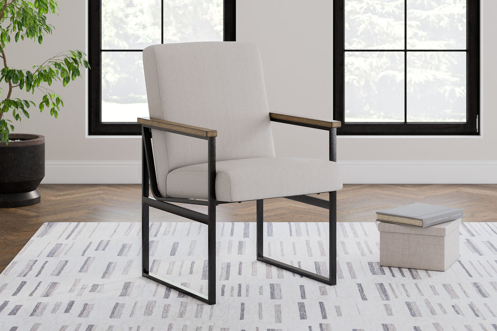 Sleek in its simplicity, this home office desk chair encourages you to work or study in style. Its mixed-material design brings a trendy, urban chic feel to your work area. With this contemporary piece, form and function are never far apart.<br><br><b>Add