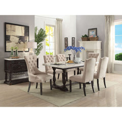 The Gerardo dining collection delivers an elegant approach on rustic inspired design, and tapered profile with a white marble top for a deliciously modern serving of mixed media style. The fashion side chairs & arm chairs feature in a soft fabric and wood