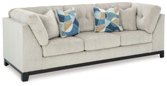 Fresh, on-trend style meets functionality in this sofa. Details like tufted cushions and a wrap-around accent base reflect your urban contemporary tastes while staying versatile as your style changes. And with its soft upholstery, your comfort is kept a p