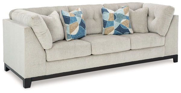 Fresh, on-trend style meets functionality in this sofa. Details like tufted cushions and a wrap-around accent base reflect your urban contemporary tastes while staying versatile as your style changes. And with its soft upholstery, your comfort is kept a p