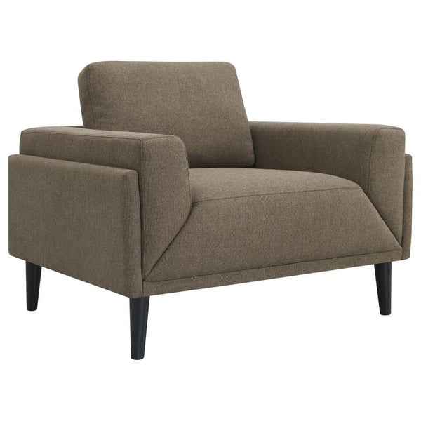 Unveiling our modern chair, where innovation meets elegance in a frame within a frame design. Adorned in a chic fabric, its streamlined silhouette is highlighted by meticulous topstitch details and track arms complemented by mitered front accents. Priorit