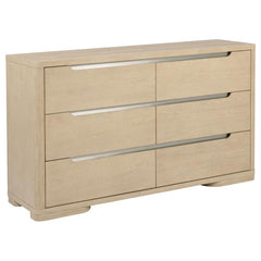 This contemporary six-drawer dresser is designed with clean lines and a light elm finish to complement modern spaces. Brushed nickel fingertip pulls and rounded corners add subtle refinement. The extra-large drawers feature tinted interiors, French doveta