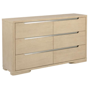 This contemporary six-drawer dresser is designed with clean lines and a light elm finish to complement modern spaces. Brushed nickel fingertip pulls and rounded corners add subtle refinement. The extra-large drawers feature tinted interiors, French doveta