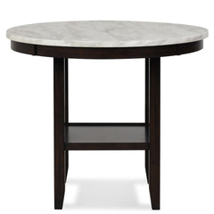 Glam up your dining space with the Celeste 42" Round Counter Table. Crafted for lasting durability, this counter table features solid Rubberwood legs and robust manufactured wood components. The heat and water-resistant faux marble top, finished with a gl