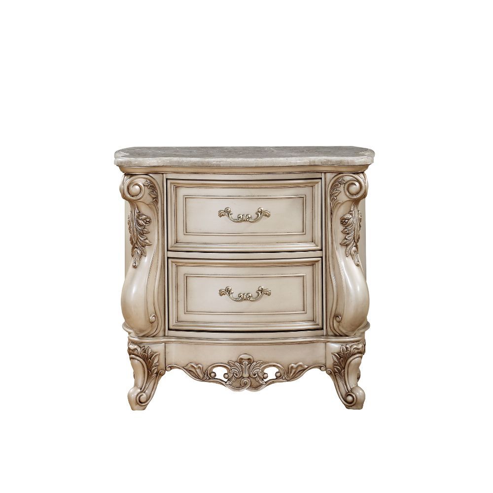 The Gorsedd mirror is exclusively designed and filled with romantic spirit. Expertly detailed, this arched mirror is crafted with elaborate carvings and raised-scrolled floral molding trim on its wood frame. Add glamorous French provincial charm with this