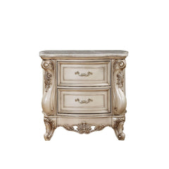 The Gorsedd mirror is exclusively designed and filled with romantic spirit. Expertly detailed, this arched mirror is crafted with elaborate carvings and raised-scrolled floral molding trim on its wood frame. Add glamorous French provincial charm with this