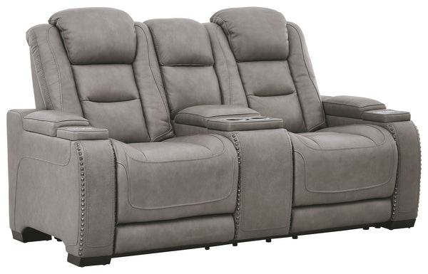 Reserved for him and made for her, this power reclining loveseat in gray delivers all the comfort and style you could ask for. Inspired by sports car interiors, the expertly matched leather and faux leather upholstery has a â€œperforated automotiveâ€ tre