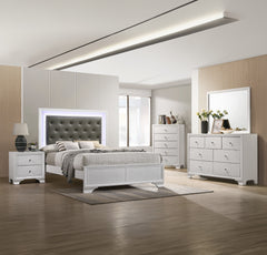 Step into a realm of sophistication and comfort with this stunning bedroom collection. Each piece showcases an exquisite blend of traditional charm and contemporary flair, making a bold statement with its textured surfaces and crisp white finish. The bed,
