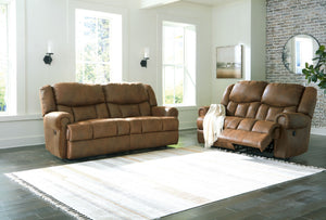 Expansive elegance. This set makes a sizable style statement. Its large scale enhances the luxe appearance, magnifying the beauty of richly warm brown faux leather. Polishing off the piece is one-touch power reclining, which adds a layer of function to th