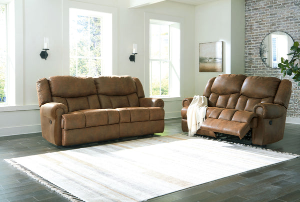 Expansive elegance. This set makes a sizable style statement. Its large scale enhances the luxe appearance, magnifying the beauty of richly warm brown faux leather. Polishing off the piece is one-touch power reclining, which adds a layer of function to th