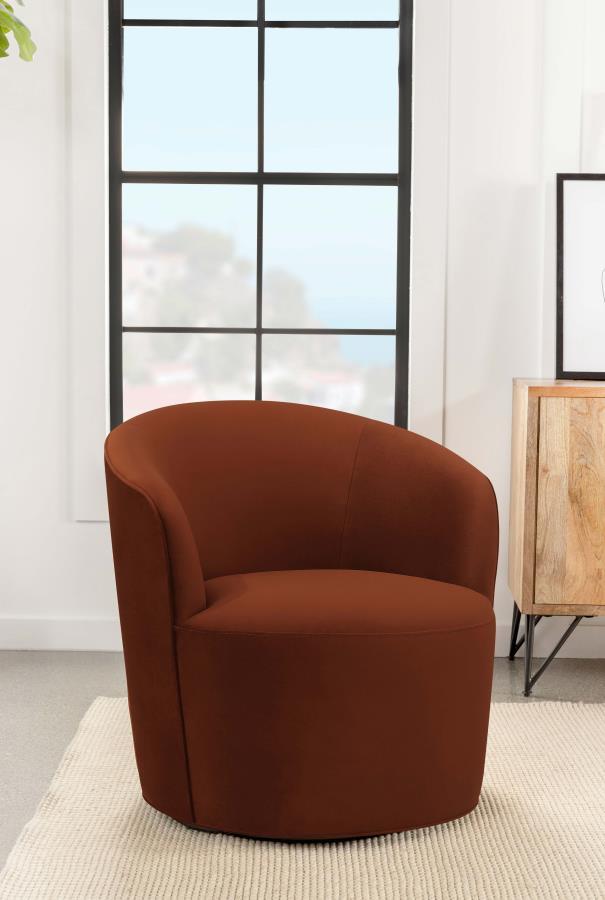 Versatile design, this contemporary burnt orange swivel chair makes itself at home in mid-century modern living rooms and retro-inspired spaces. Upholstered in a warm, burnt orange velvet that offers a soft texture, this swivel chair brings a bold splash 