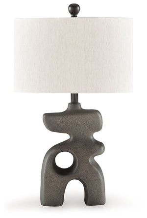 This striking table lamp is an enlightening choice for those with an eye for contemporary design. A free-flowing base and sleek oval shade elevate this piece to a simply illuminating art form. Place it anywhere you need an infusion of sophisticated style.
