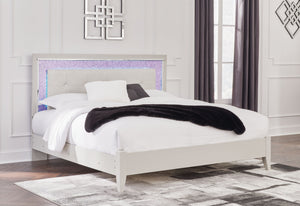  bold luxury. This king upholstered bed dazzles with its attention to detail. Your love of glamorous style is reflected in the tufted upholstery with faux alligator effect