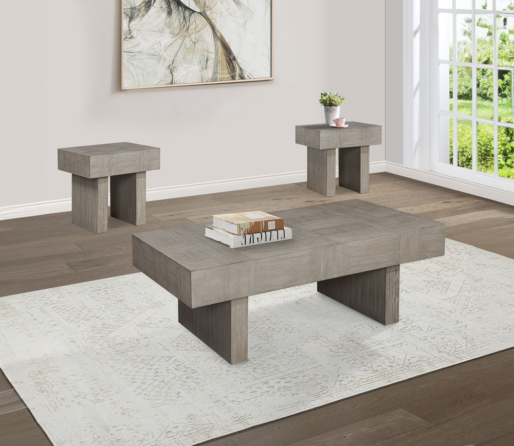 Introduce a bold statement to your living room with this striking cocktail table set, designed to captivate with its unique geometric aesthetic and robust construction. Each piece in the set features a substantial, block-like design, showcasing a richly t