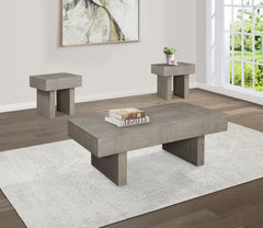 Introduce a bold statement to your living room with this striking cocktail table set, designed to captivate with its unique geometric aesthetic and robust construction. Each piece in the set features a substantial, block-like design, showcasing a richly t