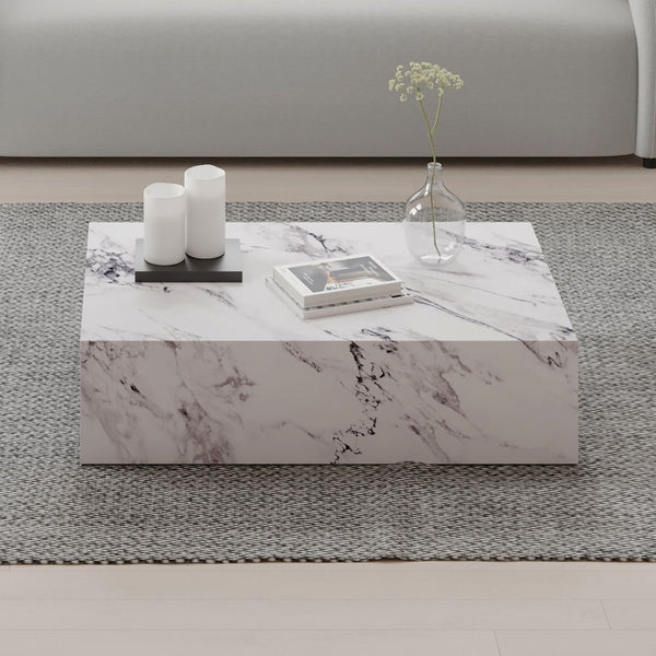 Fritzy collection coffee table, with its sleek white finish and minimalist design, exudes modern elegance. Its clean lines and spacious surface make it a perfect centerpiece for your living room. This table seamlessly blends style and functionality, offer