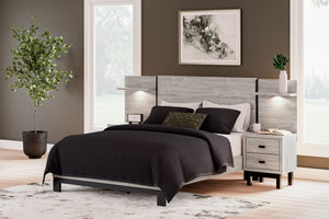  the two-toned Vessalli queen panel bed with extensions brings sleek style to your space. The sheer simplicity of its profile stunningly frames your 