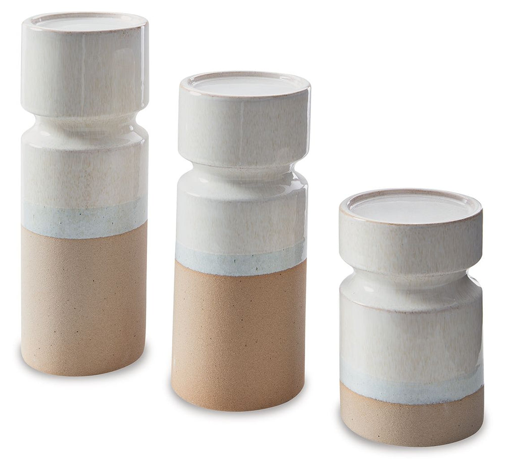 Exuding a sense of earthy elegance, this candle holder set is one tantalizing trio. With their varying heights, these candle holders permeate just the right ambiance when displayed individually or in a group. They-'re finished with a reactive glazeâ€”a te